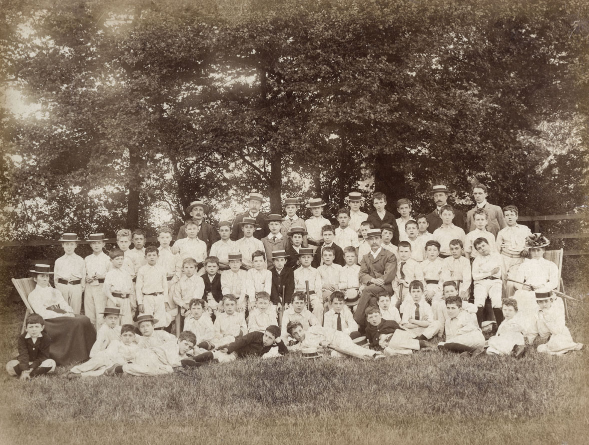 Pupils and teachers at Fretherne House Preparatory School around 1900. From an album owned by Cuthbert Gasemann who is seated 2nd row, third from left. Date: c.1900