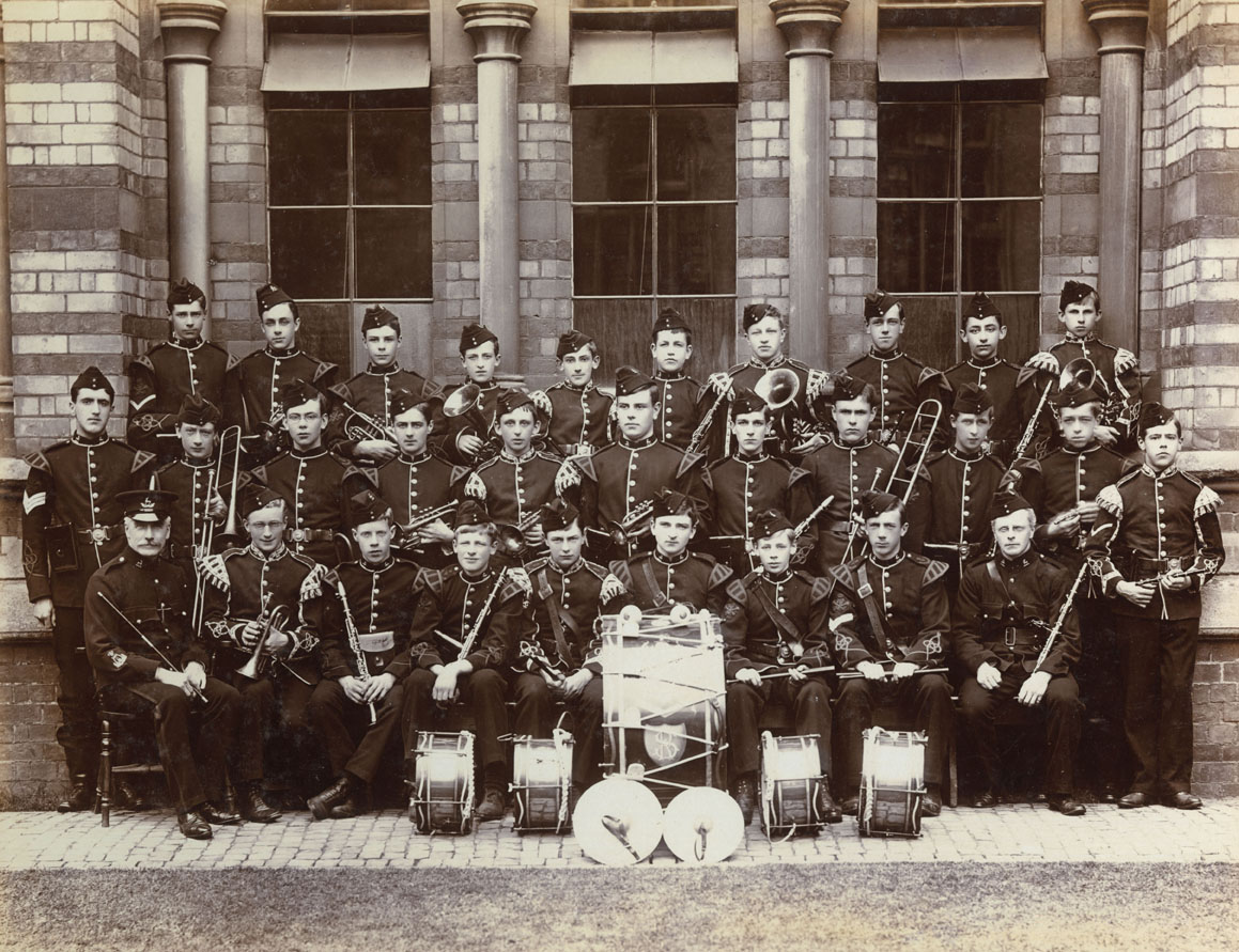 Members of the Officer Training Corps band at Rugby school in 1905. Top right of the picture is Cuthbert Gasemann, who appears to be holding a tenor horn. This photograph is one of a number in an album compiled by him. Date: 1905