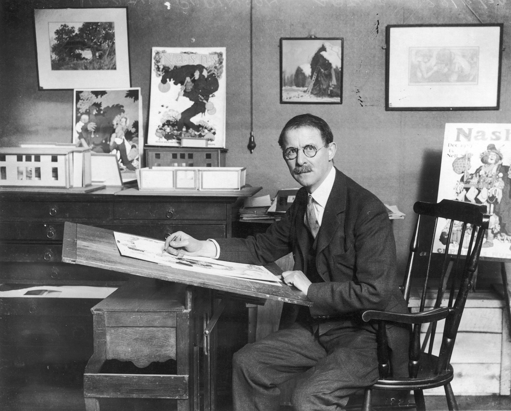 WILLIAM HEATH ROBINSON Artist and illustrator, shown working in his studio. Heath Robinson's prolific career spanned five decades. During this time, he produced countless illustrations for The Sketch and The Bystander as well as other ILN magazines. He is quoted as saying, 'I was fairly launched on my career' of Bruce Ingram's decision to publish his illustrations in The Sketch in March 1906. He is best-known for his ingenious contraptions but his work extended to the themes of golf, cricket, war, gardening and more. Date: 1872 - 1944