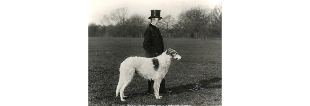 The original Thomas Fall, dog photographer, with a borzoi owned by H.M. Queen Alexandra. Date: 1893