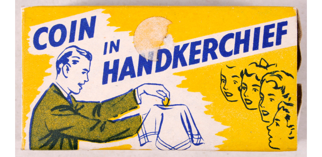 1950s, coin in handkerchief, trick, game, schooldays. Date: