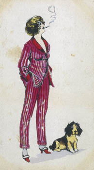Forward young woman wears a cerise pink & red pyjama suit - the jacket has a roll collar & cuffs & fastens with frogs. She has fur trimmed mules on her feet & a cigarette holder. Date: circa 1918