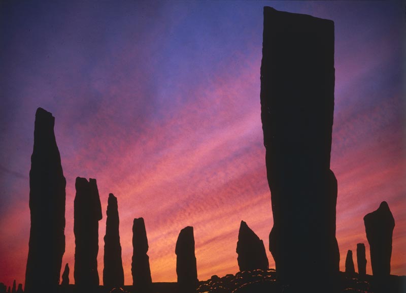 Sunset over the ancient standing stones of Callanish Stone Circle, Isle of Lewis, outer Hebrides, Scotland. Date: 1980