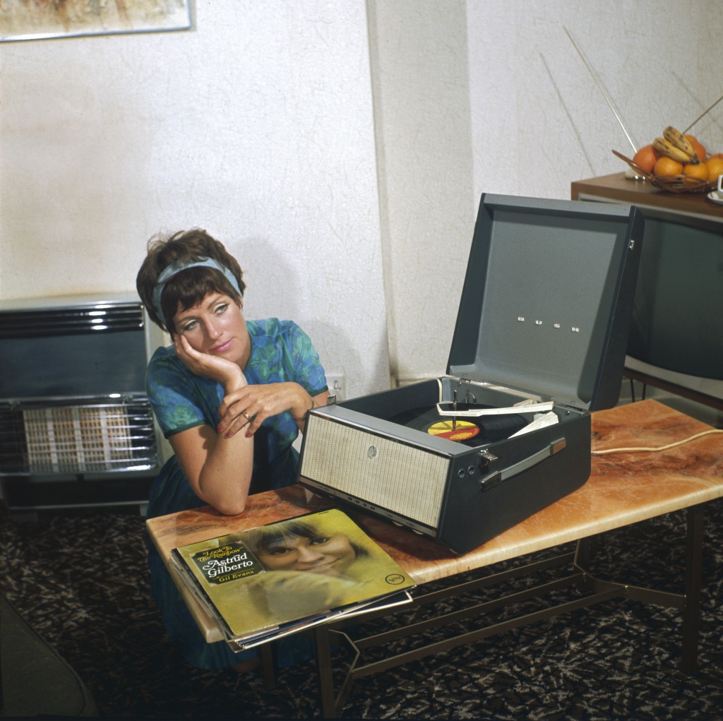 A dreamy teenager listening to her new Astrud Gilberto LP on her record player.
1960s