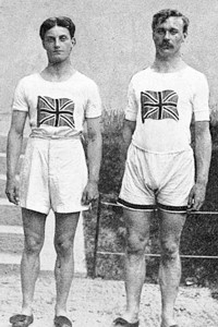 The English 4 x 100 metres relay team who won gold medals at the Stockholm Olympics in 1912. From left to right: D. Jacobs, H. M. Macintosh, W. R. Applegarth and V. D'Arcy. Note the high-waisted shorts and T-shirts emblazoned with a Union Jack. Date: 1912