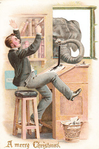 A man working in his office is surprised by an elephant putting its head through the window and spilling a pot of ink on a cutout Christmas card (front). (1 of 2) Date: circa 1890s