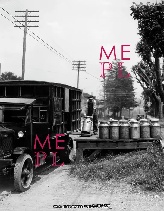 : 1920s Delivery Man Unloading Milk : 1920s Delivery Man Unloading Milk