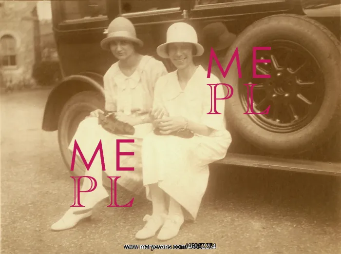 : Two 1920s ladies and large car : Two 1920s ladies and large car