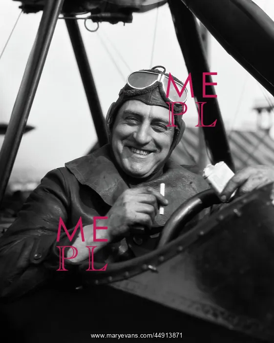 : 1920s SMILING MAN PILOT IN COCKPIT OF AIRPLANE : 1920s SMILING MAN PILOT IN COCKPIT OF AIRPLANE