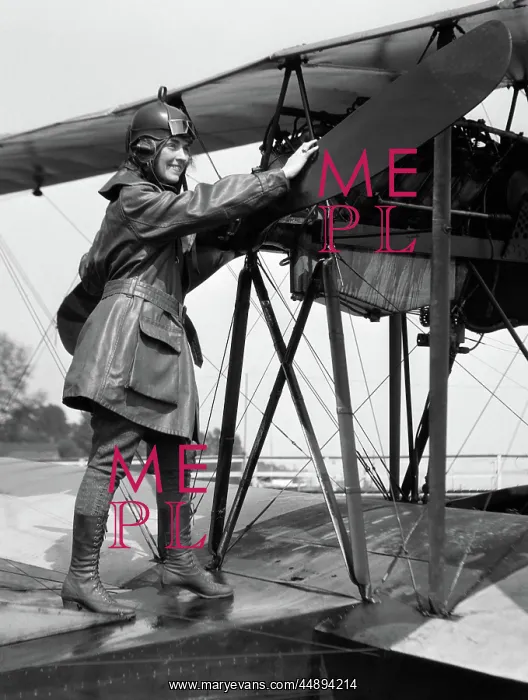 : 1920s SMILING WOMAN AVIATOR TURNING FLOAT BIPLANE : 1920s SMILING WOMAN AVIATOR TURNING FLOAT BIPLANE