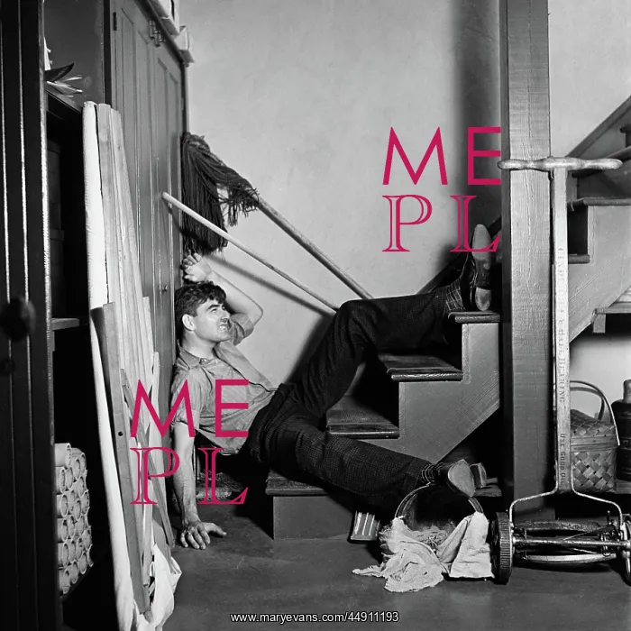 : 1930s 1940s man lying at bottom basement stairs : 1930s 1940s man lying at bottom basement stairs