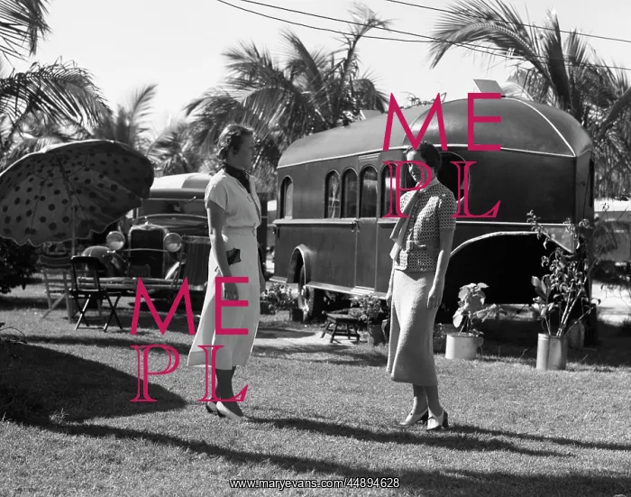 : 1930s 2 Women Standing Talking : 1930s 2 Women Standing Talking