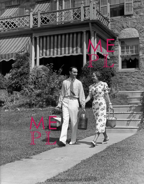  : 1930s Couple Walking Out Of House