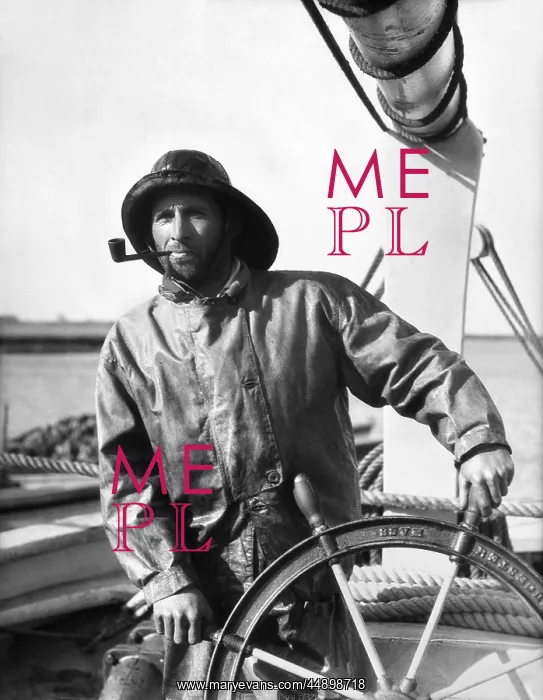 : 1930s Man At The Helm Wheel Of : 1930s Man At The Helm Wheel Of