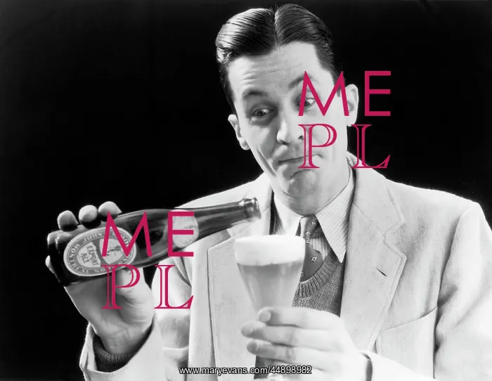 : 1930s Man Pouring Beer From Bottle : 1930s Man Pouring Beer From Bottle