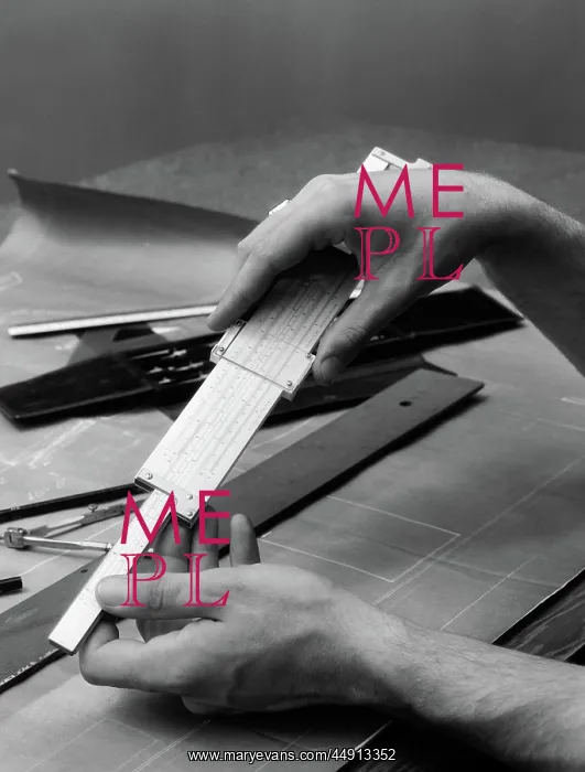 : 1930s MAN'S HANDS USING SLIDE RULE OVER DRAFTING : 1930s MAN'S HANDS USING SLIDE RULE OVER DRAFTING