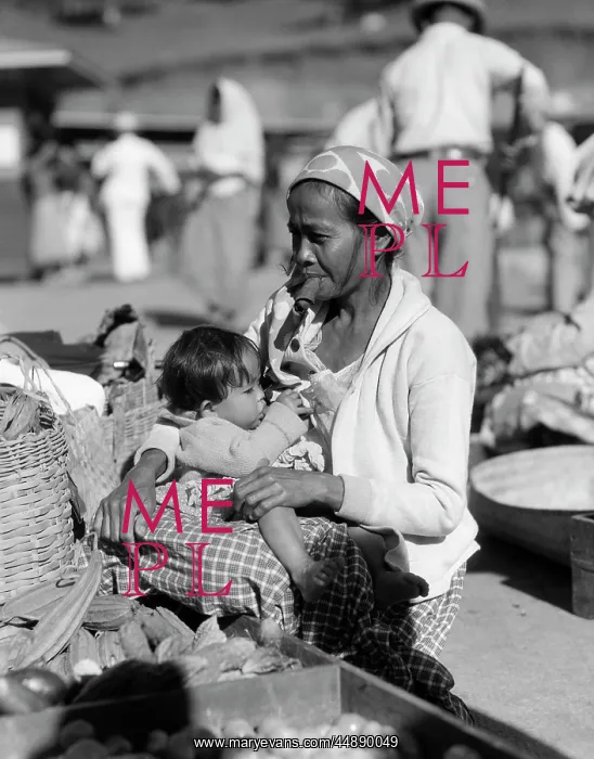 : 1930s Mother Sitting Clutching : 1930s Mother Sitting Clutching