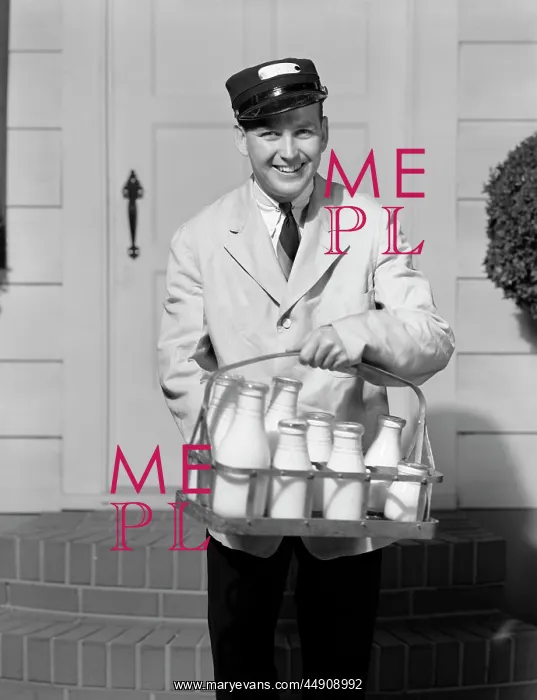 : 1930s smiling milkman looking at camera delivering : 1930s smiling milkman looking at camera delivering