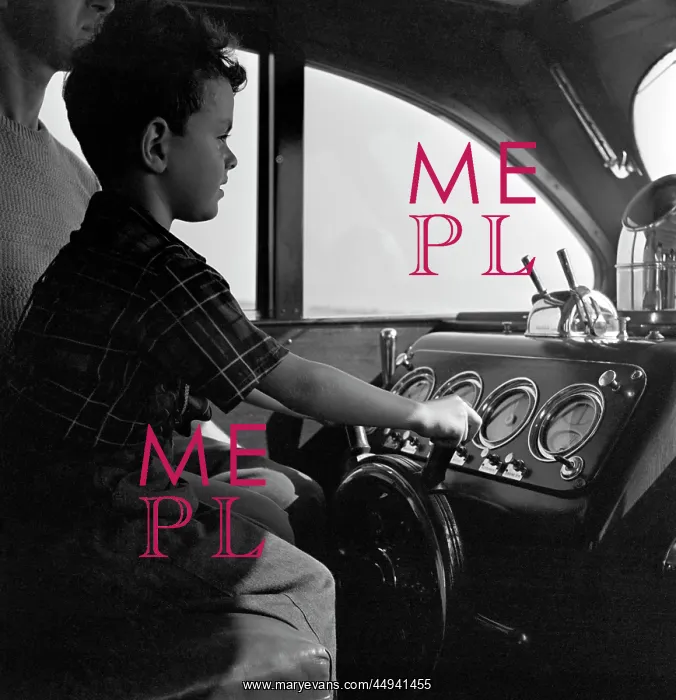  : 1940s Boy Sitting At Controls