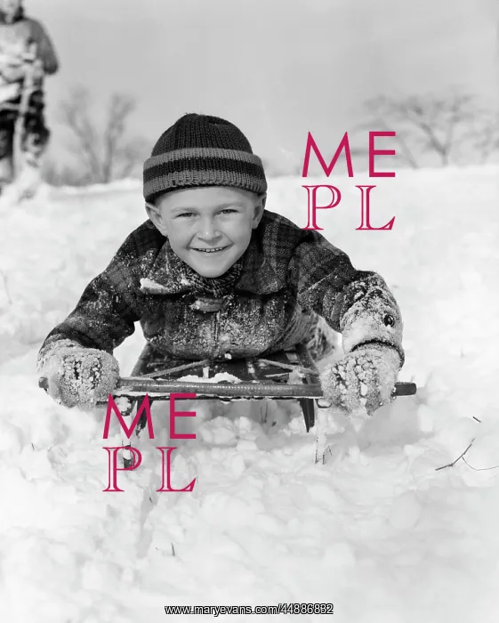  : 1940s Boy On Sled In Snow Facing