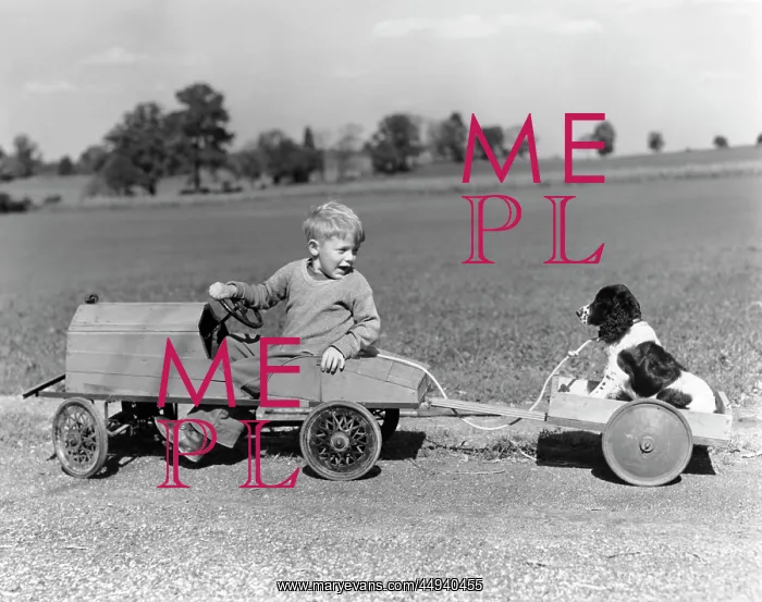  : 1940s Boy In Wooden Toy Car Pulling