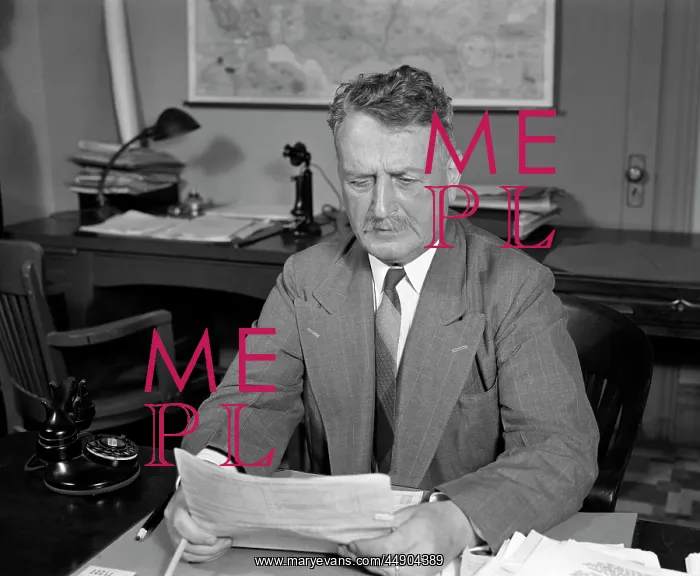 : 1940s Businessman At Desk Reading : 1940s Businessman At Desk Reading