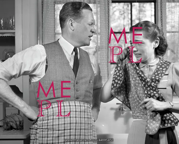 : 1940s Couple In Kitchen Wearing : 1940s Couple In Kitchen Wearing