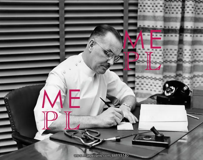  : 1940s Doctor Sitting At Desk Writing