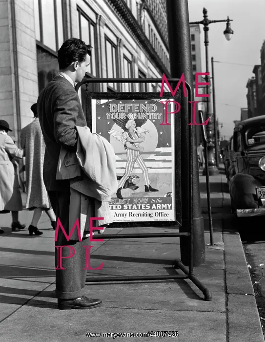  : 1940s Man Looking At Army Recruiting