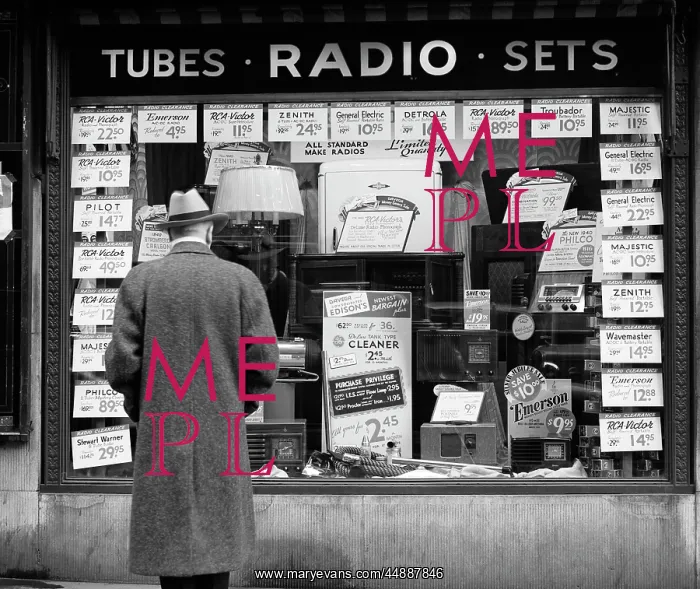 : 1940s MAN LOOKING AT WINDOW DISPLAY OF RADIOS : 1940s MAN LOOKING AT WINDOW DISPLAY OF RADIOS
