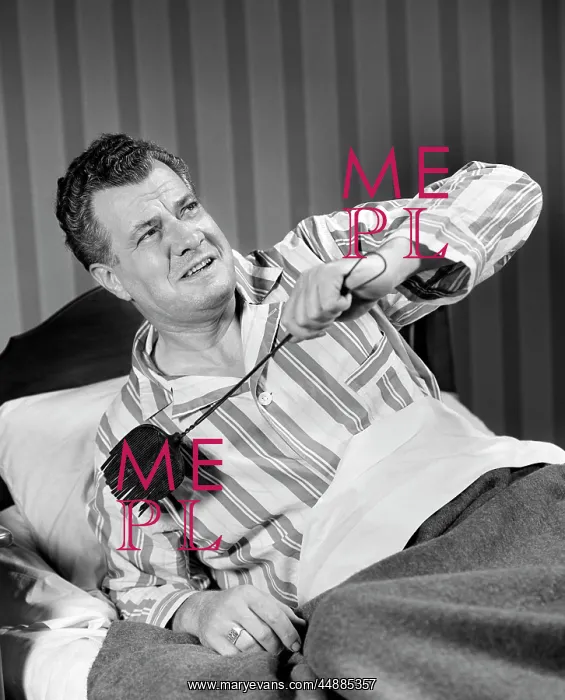  : 1940s Man Sitting In Bed With