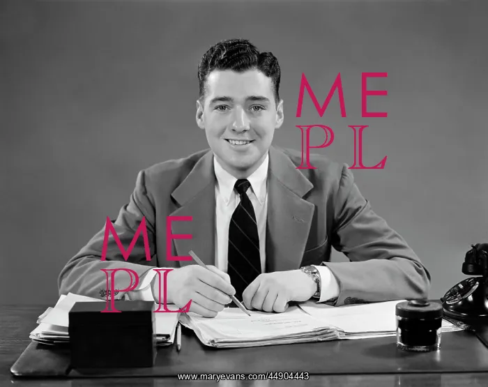  : 1940s Man Sitting At Desk In Office