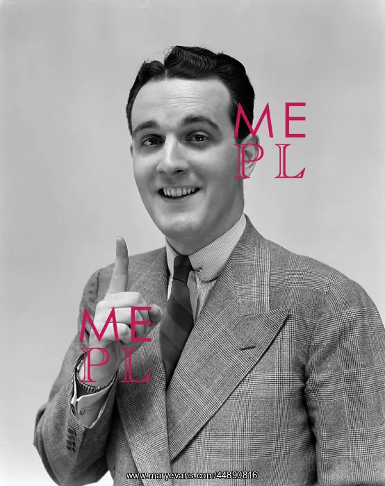 : 1940s Man In Suit Holding Up Index : 1940s Man In Suit Holding Up Index