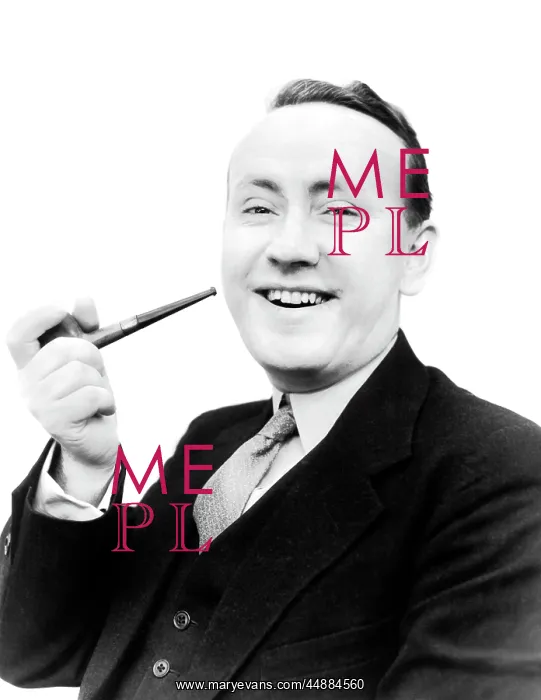 : 1940s Portrait Man Holding Pipe : 1940s Portrait Man Holding Pipe