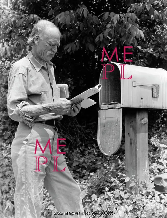  : 1940s Senior Farmer Reading Mail
