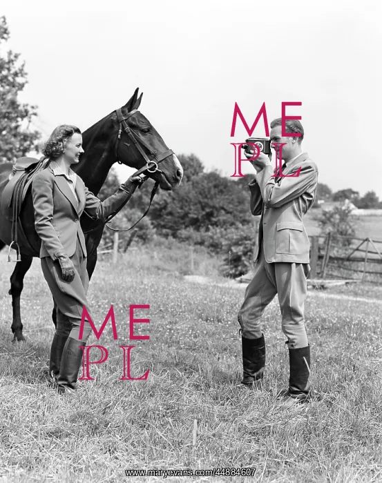 : 1940s Smiling Equestrian Couple : 1940s Smiling Equestrian Couple