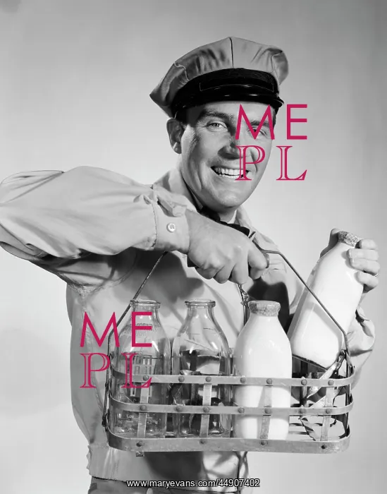 : 1950s 1960s smiling milkman in uniform looking : 1950s 1960s smiling milkman in uniform looking