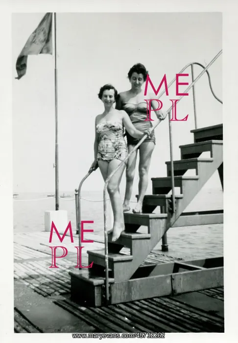 : 1950s Bathing Lovelies posing on a set of steps : 1950s Bathing Lovelies posing on a set of steps