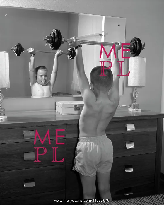  : 1950s Boy Exercising With Dumbbell