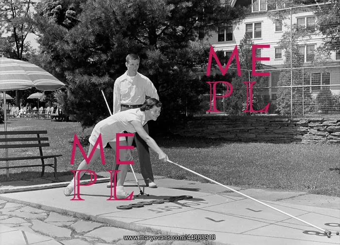  : 1950s Boy And Girl Playing Deck
