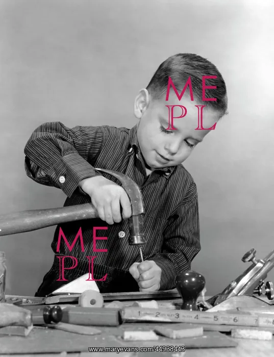  : 1950s Boy Playing With Hammer