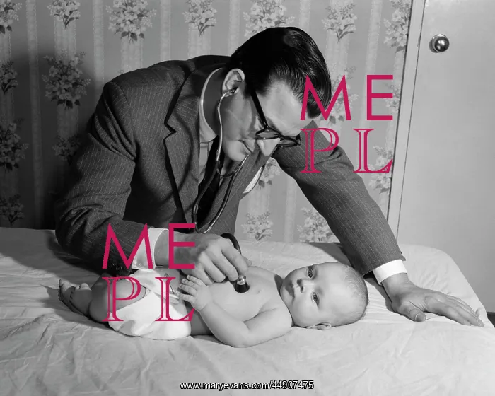 : 1950s doctor on house call holding stethoscope : 1950s doctor on house call holding stethoscope