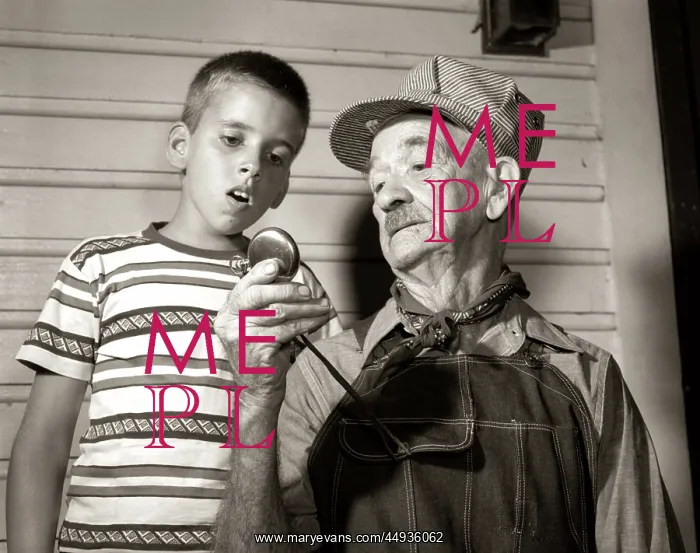 : 1950s Elderly Man Grandfather Train Engineer Holding up P : 1950s Elderly Man Grandfather Train Engineer Holding up P