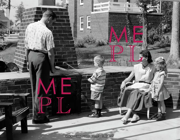  : 1950s Family On Bricked Backyard