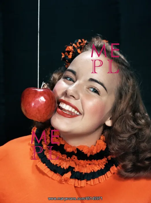 : 1950's Girl Eating Apple On A String : 1950's Girl Eating Apple On A String