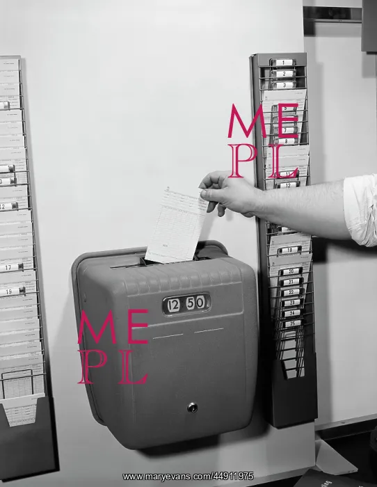  : 1950s MALE HAND DROPPING CARD INTO TIME CLOCK