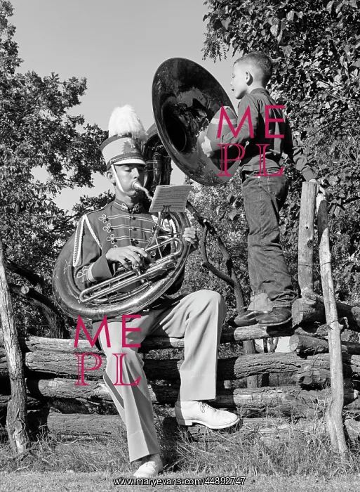 : 1950s Man Playing A Tuba Sitting : 1950s Man Playing A Tuba Sitting