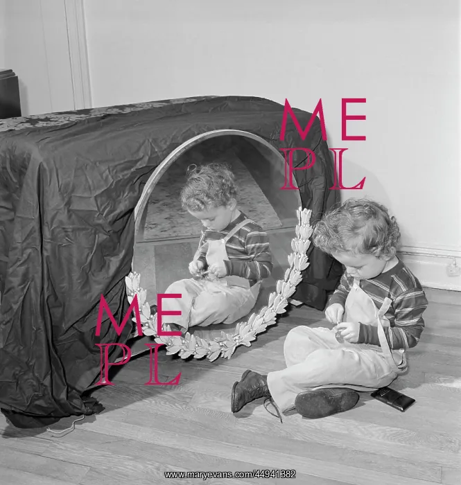 : 1950s Small Boy Sitting On Floor : 1950s Small Boy Sitting On Floor