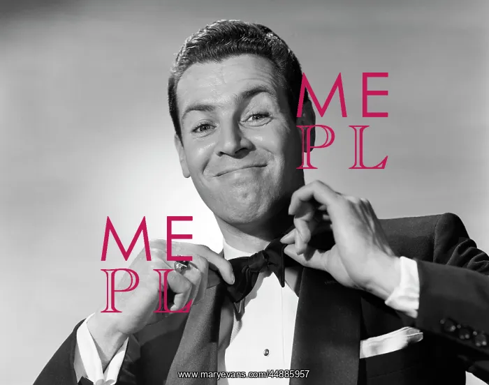 : 1950s Smiling Man In Tucks Tieing : 1950s Smiling Man In Tucks Tieing
