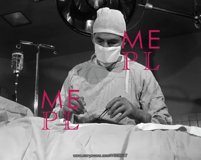  : 1950s SURGEON STANDING INSIDE OPERATING ROOM